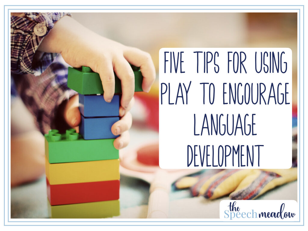 title, "Five Tips play to encourage development" and a picture of a young child playing with large clicking bricks.